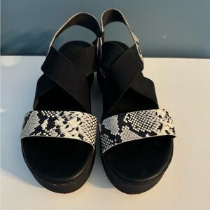 Sorel chunky snakeskin sandals